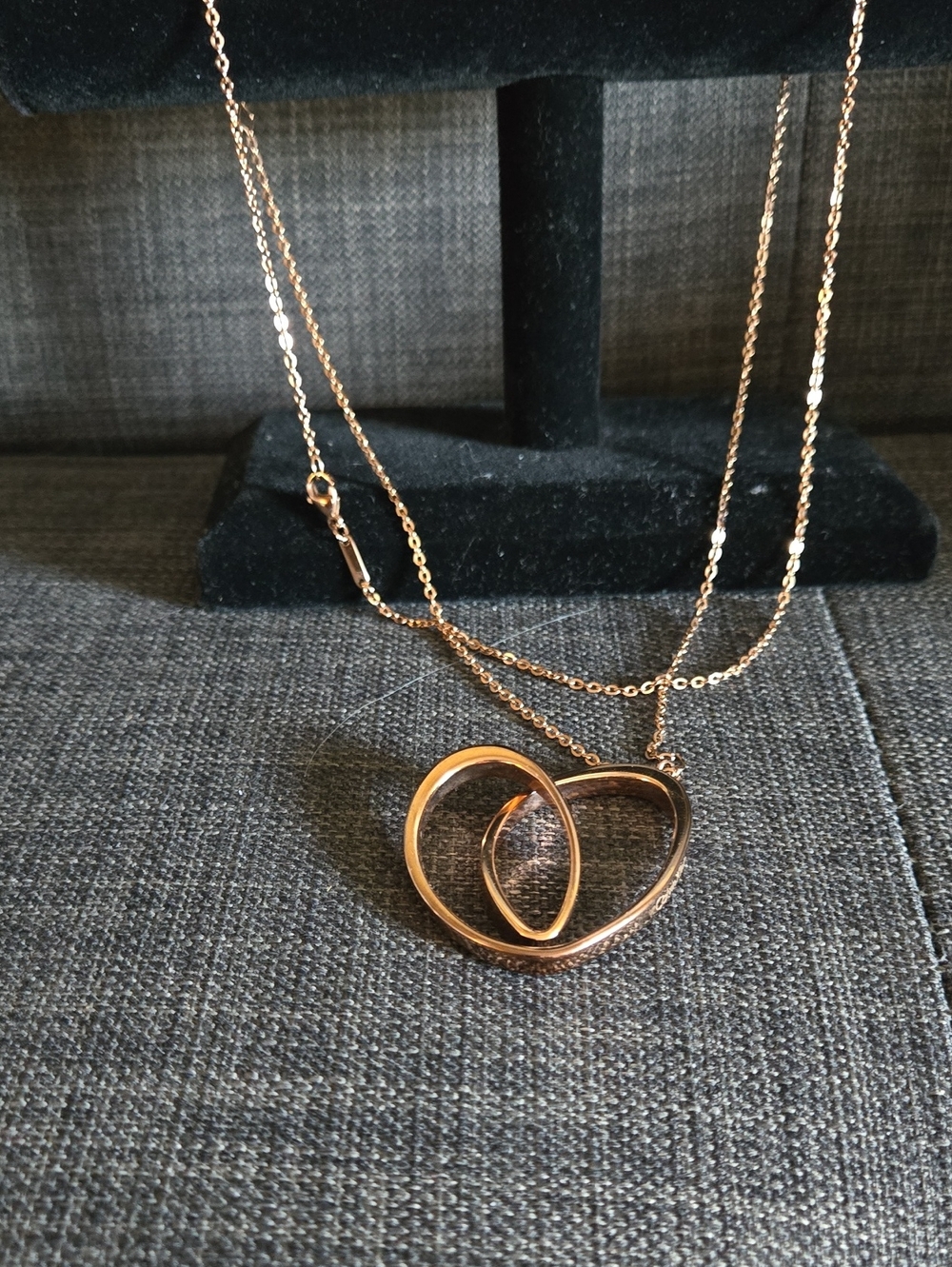 Interlocking Heart Pendant Necklace in Rose Gold Tone